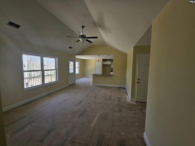 unfurnished living room with lofted ceiling, visible vents, baseboards, and a ceiling fan