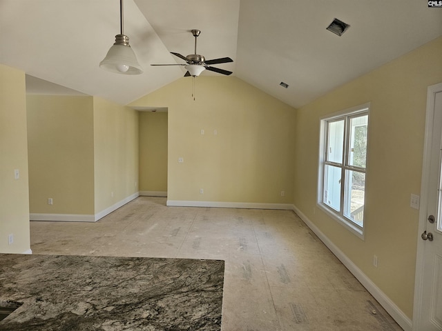 unfurnished room with lofted ceiling, baseboards, and a ceiling fan