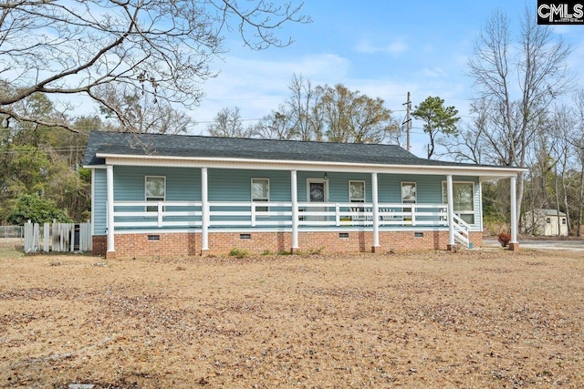 view of front facade with a porch and crawl space