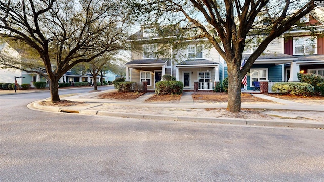 view of property featuring a porch