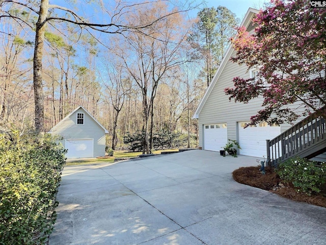 view of side of property with an outdoor structure