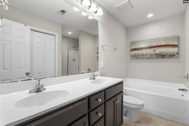 bathroom with a sink, visible vents, a bath, and tile patterned flooring