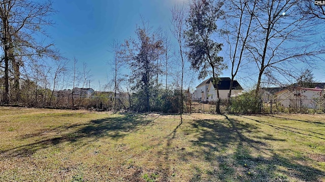 view of yard with fence