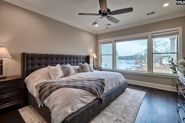 bedroom featuring recessed lighting, dark wood-style flooring, visible vents, baseboards, and ornamental molding