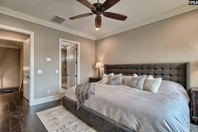 bedroom featuring baseboards, visible vents, hardwood / wood-style flooring, ceiling fan, and crown molding