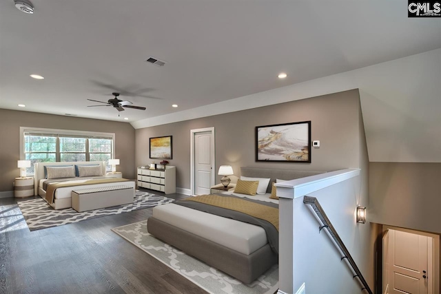 bedroom featuring baseboards, wood finished floors, visible vents, and recessed lighting