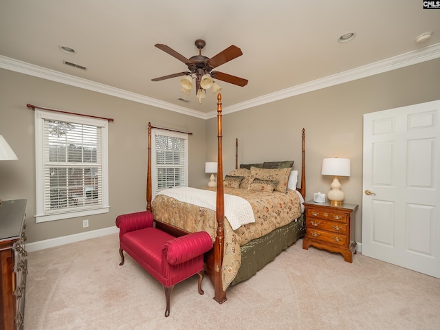 bedroom featuring carpet, crown molding, visible vents, ceiling fan, and baseboards