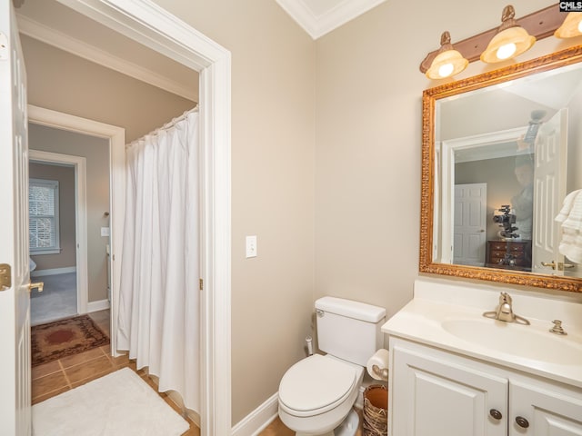 full bathroom featuring baseboards, toilet, ornamental molding, tile patterned flooring, and vanity