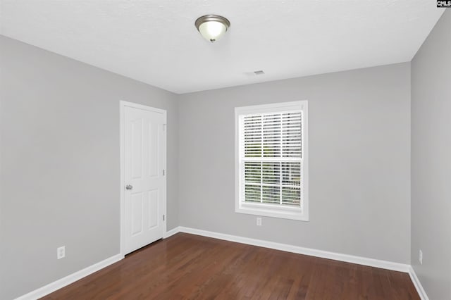 257 Castlebury Dr, Columbia, SC 29229 - unfurnished room with dark wood finished floors, visible vents, and baseboards
