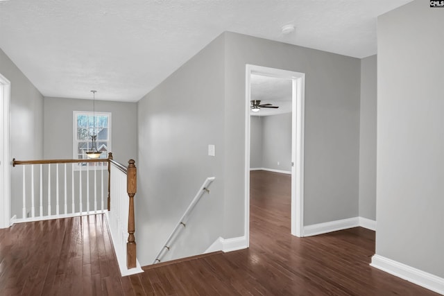 257 Castlebury Dr, Columbia, SC 29229 - staircase featuring ceiling fan, baseboards, a textured ceiling, and wood finished floors