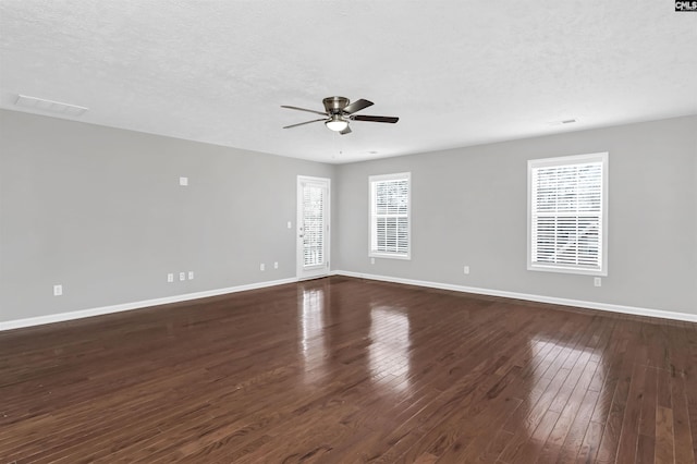 257 Castlebury Dr, Columbia, SC 29229 - unfurnished room featuring ceiling fan, a textured ceiling, baseboards, and dark wood-style flooring