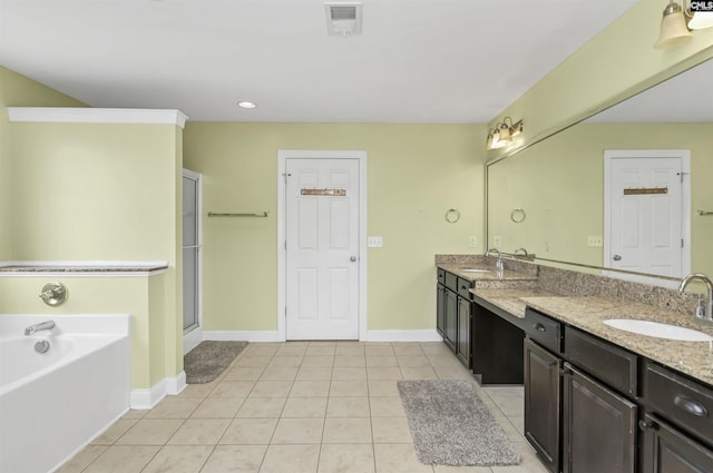 full bathroom with visible vents, a sink, tile patterned flooring, double vanity, and a bath