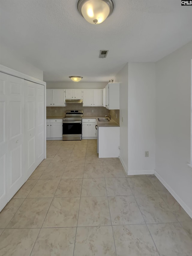 kitchen with white cabinetry, electric range, visible vents, and a sink