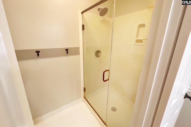 bathroom featuring a stall shower