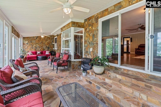 view of patio featuring an outdoor hangout area and a ceiling fan