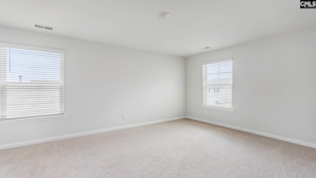 1304 Mosser Dr, Columbia, SC 29203 - carpeted spare room featuring visible vents and baseboards