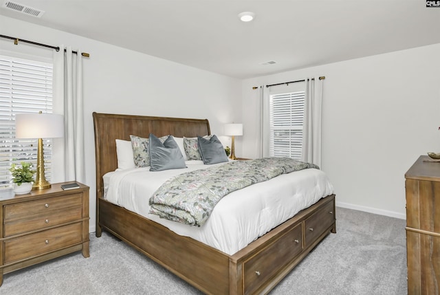 1304 Mosser Dr, Columbia, SC 29203 - bedroom featuring visible vents, baseboards, and light colored carpet