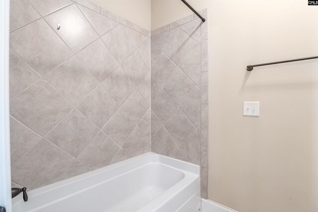 bathroom with shower / bathtub combination