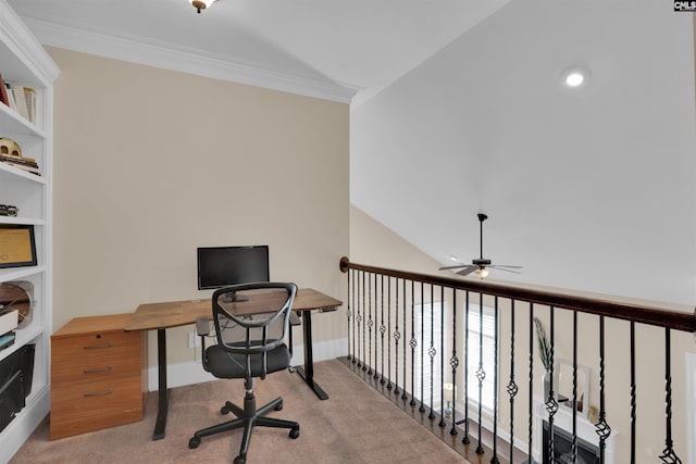 office area with light colored carpet, ceiling fan, baseboards, and ornamental molding