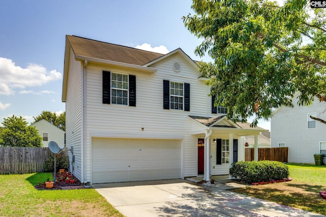 traditional-style home featuring a garage, concrete driveway, a front lawn, and fence