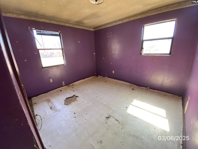 spare room with plenty of natural light