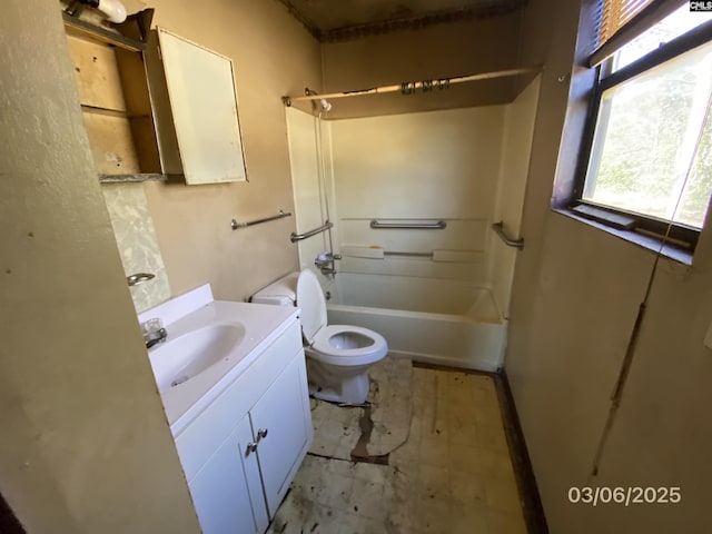 full bath featuring washtub / shower combination, toilet, and vanity