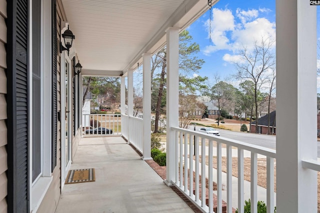 balcony with a porch and a residential view