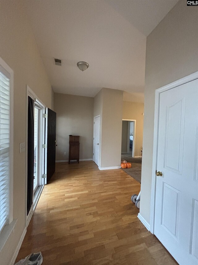 416 Knotts Ct, Lexington, SC 29073 - hallway with visible vents, baseboards, and light wood-style floors