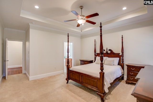 bedroom featuring baseboards, recessed lighting, ornamental molding, light carpet, and a raised ceiling