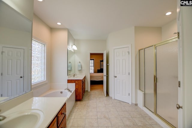 full bath featuring recessed lighting, ensuite bathroom, vanity, and a shower stall