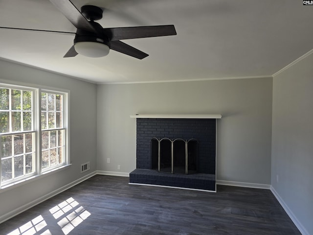 unfurnished living room with visible vents, a brick fireplace, baseboards, and ornamental molding