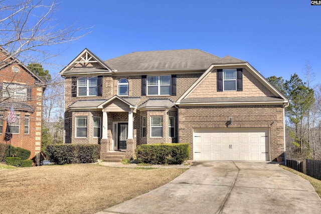 craftsman-style house with concrete driveway, brick siding, and a garage