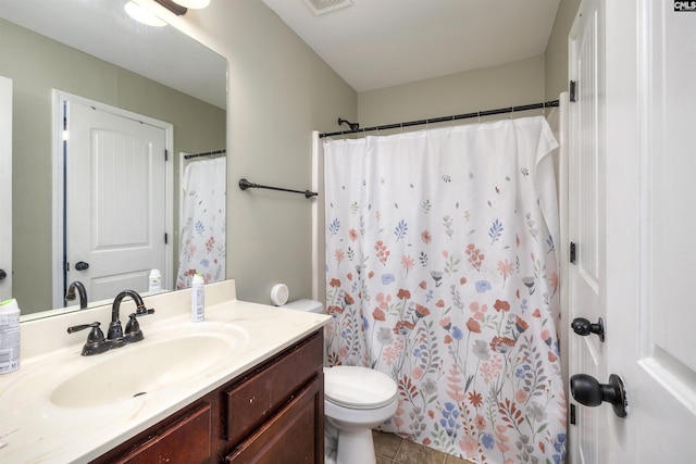 bathroom with tile patterned floors, visible vents, toilet, curtained shower, and vanity