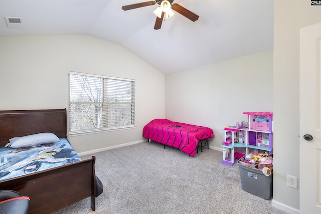 bedroom featuring visible vents, lofted ceiling, a ceiling fan, carpet flooring, and baseboards