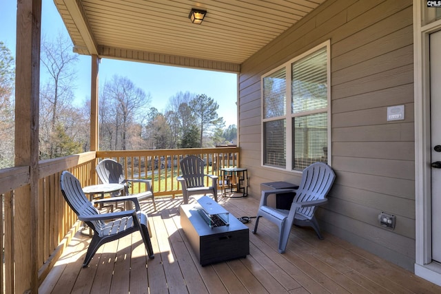 deck featuring a fire pit