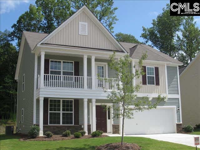 view of front of house with cooling unit, driveway, an attached garage, covered porch, and board and batten siding