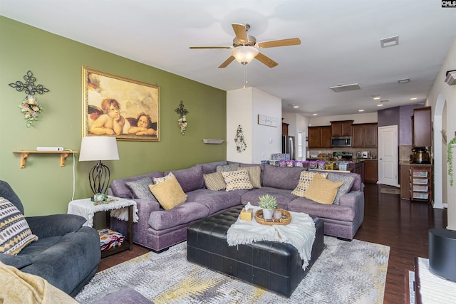 living room with dark wood-style floors, visible vents, recessed lighting, and ceiling fan