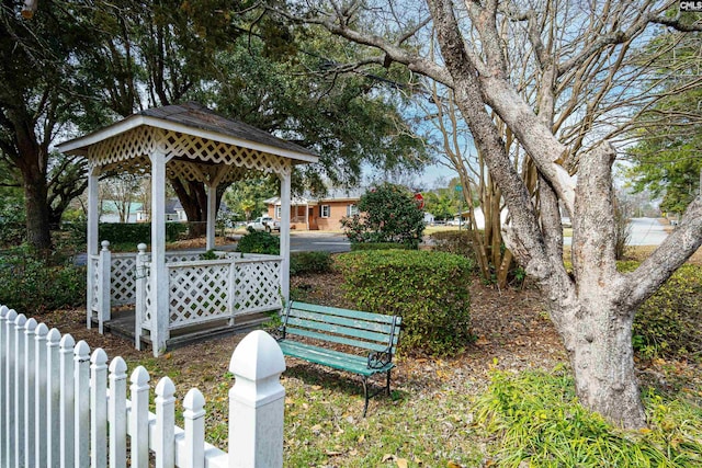 view of yard featuring a gazebo and fence