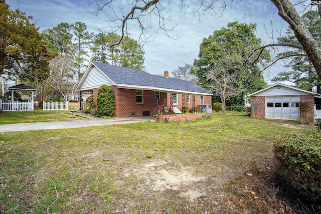 view of front of property with brick siding, crawl space, a front lawn, and driveway