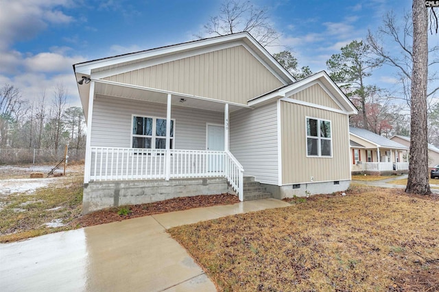 manufactured / mobile home with a porch and crawl space