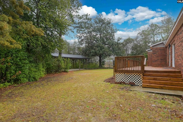 view of yard with a deck