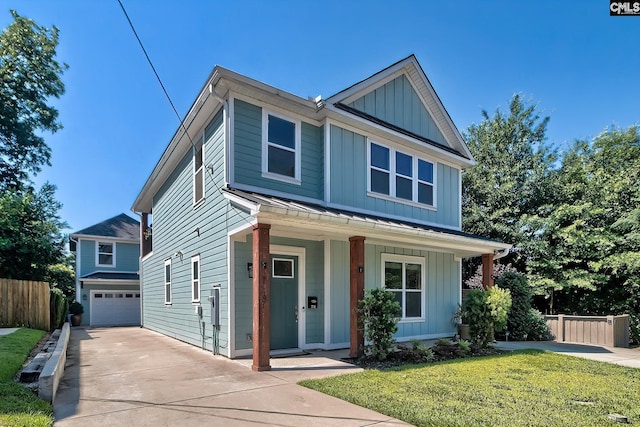 view of front of house with covered porch, board and batten siding, an attached garage, and fence