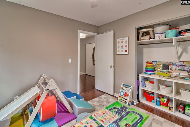 game room with wood finished floors