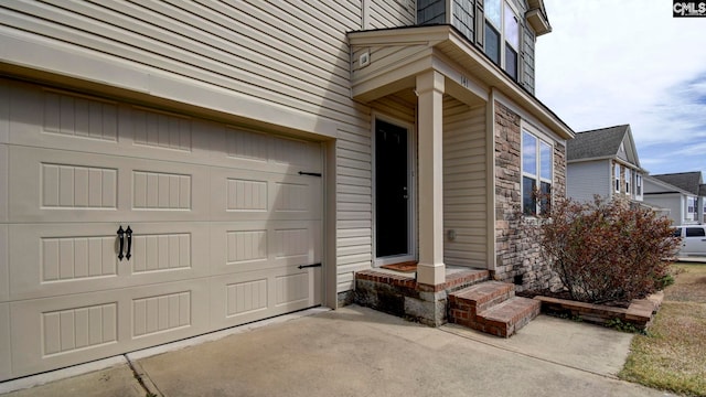 garage featuring driveway