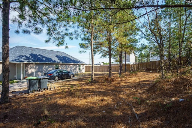 view of yard with fence