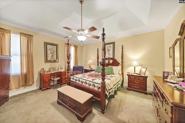 bedroom featuring baseboards, light carpet, ceiling fan, and crown molding