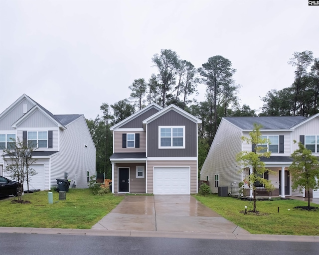 view of front of property with central AC unit, driveway, a front yard, and a garage