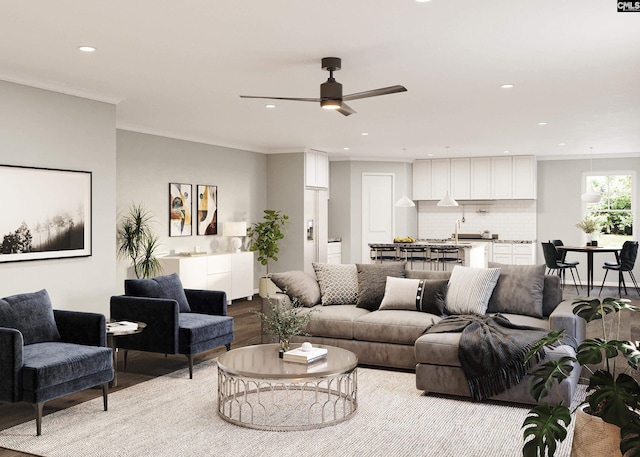 living area featuring crown molding, recessed lighting, wood finished floors, and ceiling fan