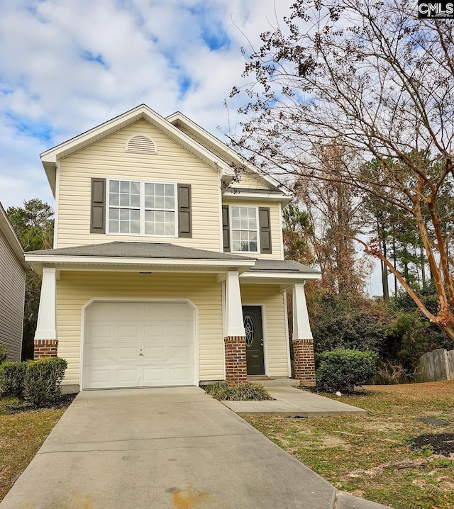 view of front of home with brick siding, concrete driveway, and a garage