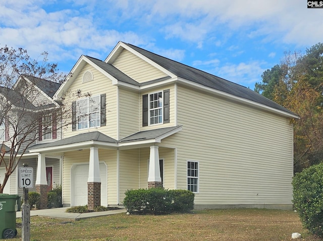 view of side of home featuring a garage